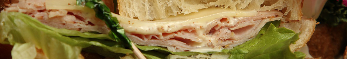 Eating Deli Sandwich at Edwards Ham Shop of Surry restaurant in Surry, VA.